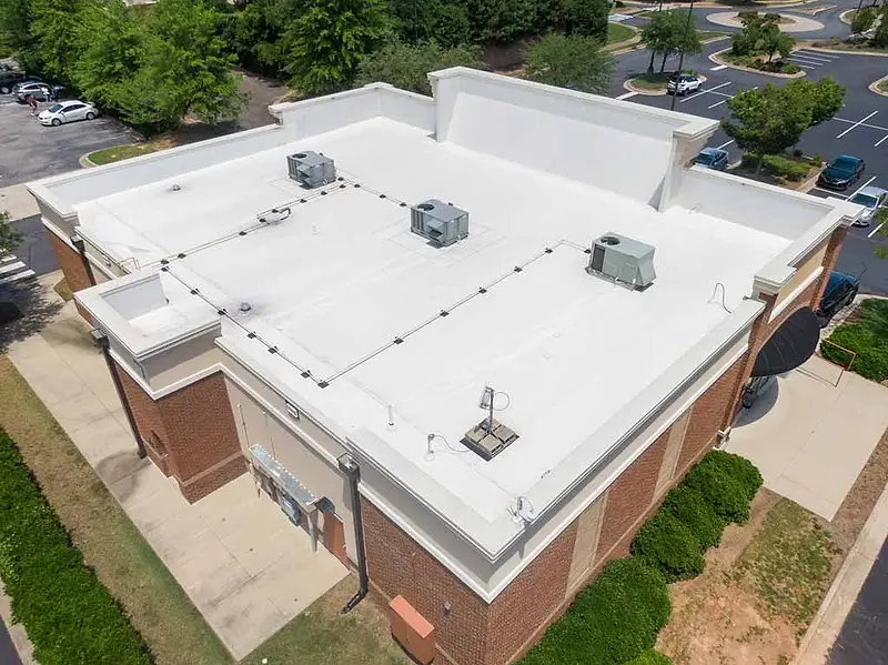 White flat roof on a commercial building, from above